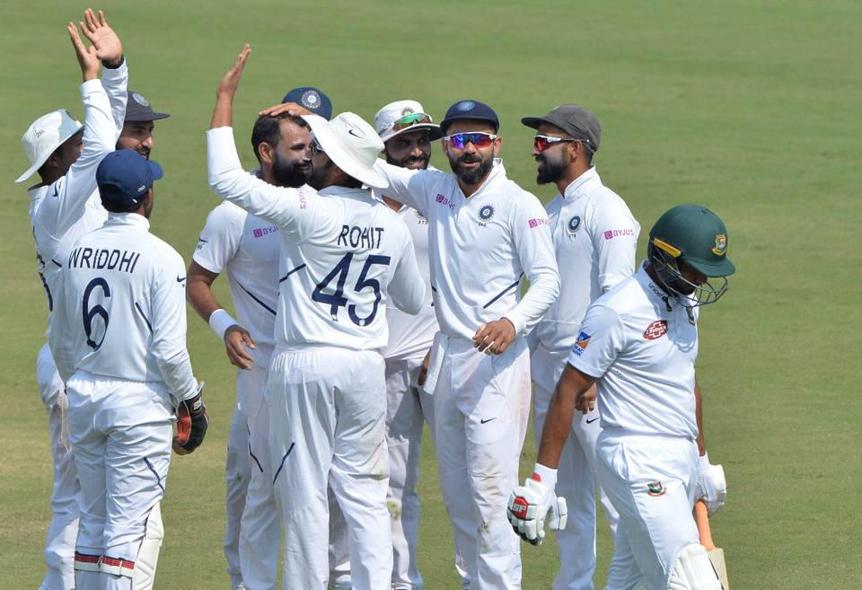 Mohammad Shami celebrates the wicket of Mahmudullah with teammates on the third day of the Test Match at the Holkar Cricket Stadium in Indore on Saturday, November 16, 2019.