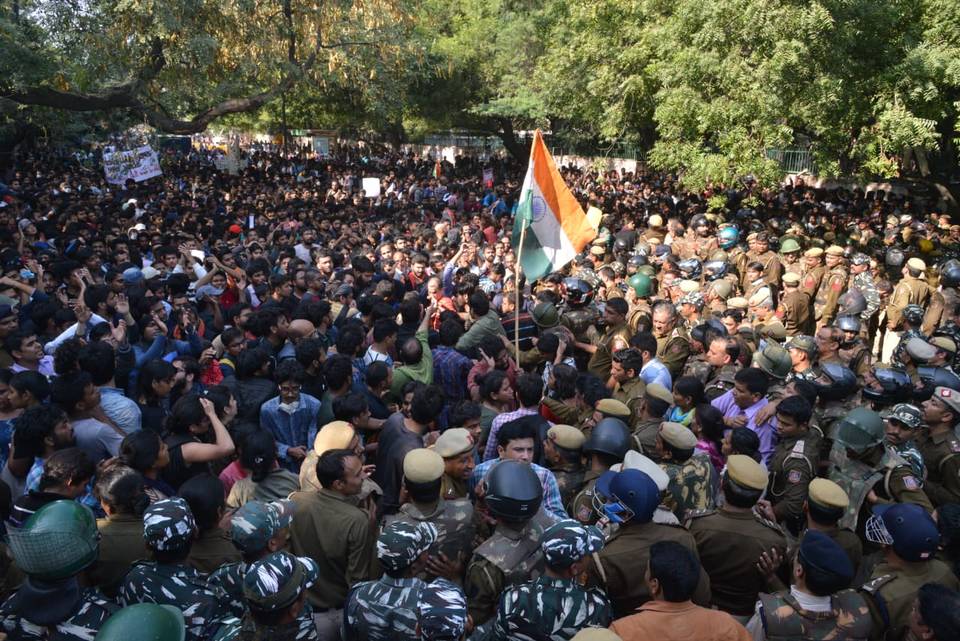 JNU students and police clash in New Delhi as the students attempt to march towards the parliament, on Monday.