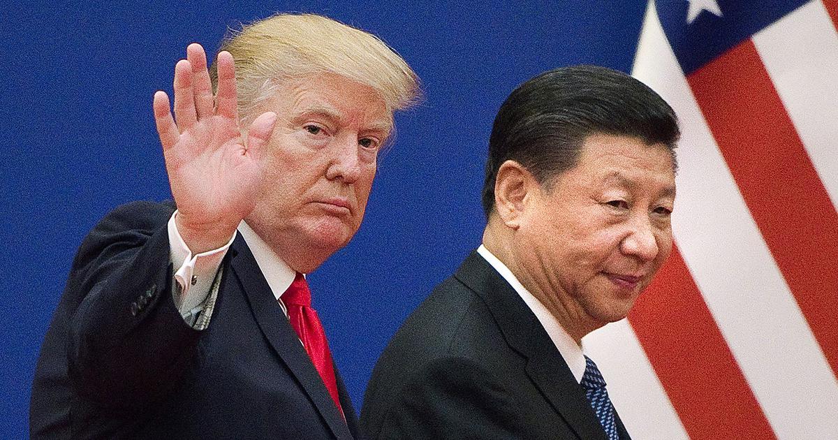 A file photo of Donald Trump with Xi Jinping.