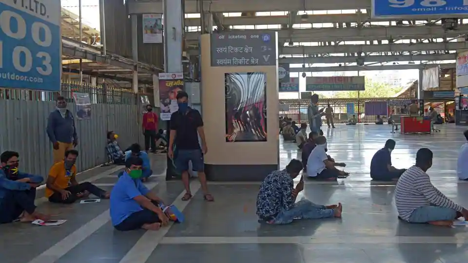 Passengers in queue at Dadar station after Indian railways re-open train ticket counters fro reservation following social distancing guidelines and observe the hygiene protocols in view of the ongoing COVID-19 pandemic in Mumbai.