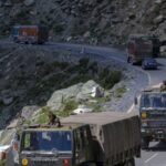 An Indian army convoy moves on the Srinagar- Ladakh highway at Gagangeer, northeast of Srinagar, Wednesday, Sept. 9, 2020.