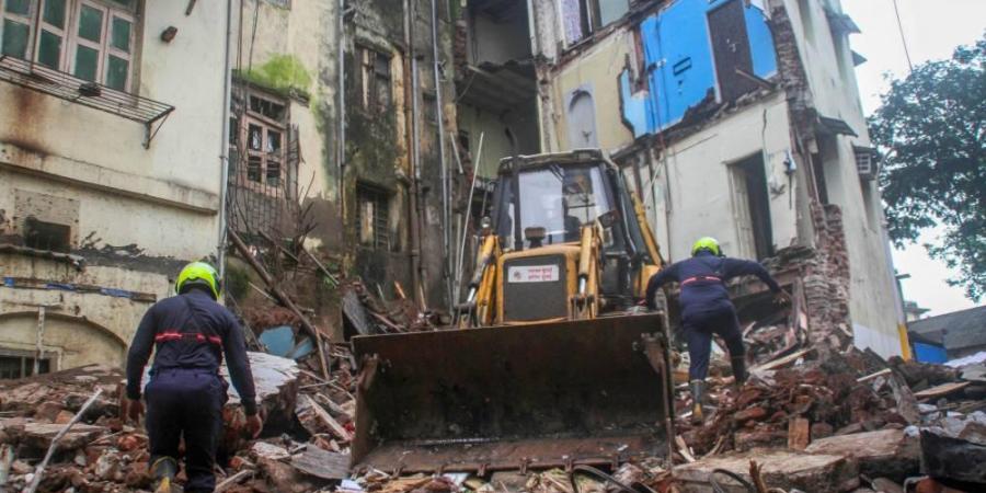 Rescue operation carried out by firefighters after a multi-storeyed building collapsed at Dongri in Mumbai Wednesday .