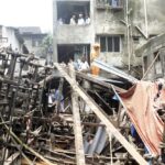 Indian National Disaster Response Force (NDRF) officials rescue people from the rubble of a three-storey Gilani building in Bhiwandi that collapsed on the outskirts of Mumbai, India, September, 21 2020.