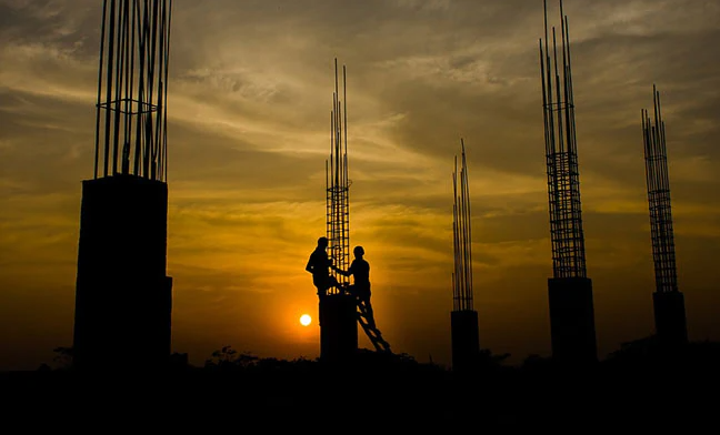 Rescue operation underway at a Mumbai construction site where a slab collapse resulted in three deaths and injuries.