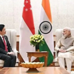 Prime Minister Narendra Modi meets with Singaporean officials during his visit to strengthen bilateral relations and discuss future agreements.