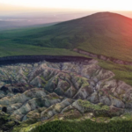 The Batagaika Crater in Siberia, known as the "Gateway to Hell," has significantly expanded over 30 years, showing rapid growth due to climate change.