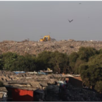 Officials inspect Deonar landfill site in Mumbai, where biomining is planned ahead of Dharavi redevelopment.